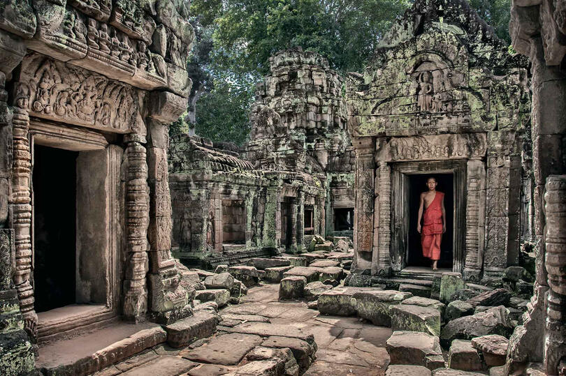 The Ancient Temple Daily life scene at the Preah Khan temple at Angkor Wat Buy Print