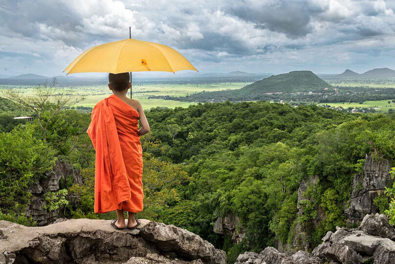Meditation Portrait of a Buddhist novice contemplating the landscape Buy Print