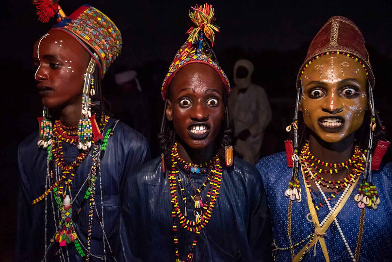 Night Celebrations Sudosukai - Wodaabe people celebrating the Gerewol festival by night Buy Print