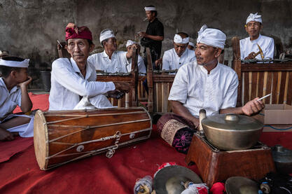 Gamelan Musicians Group of gamelan musicians playing traditional melodies to guide the Rejang dancers © Roberto Pazzi