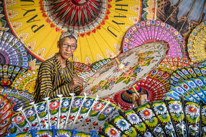 The Artist and the Craft Portrait of an elderly umbrella artisan at work © Roberto Pazzi