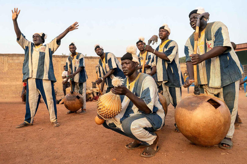 Panther Man Senoufo Musicians marking the rhythm of the Boloye, also known as panther dance © Roberto Pazzi