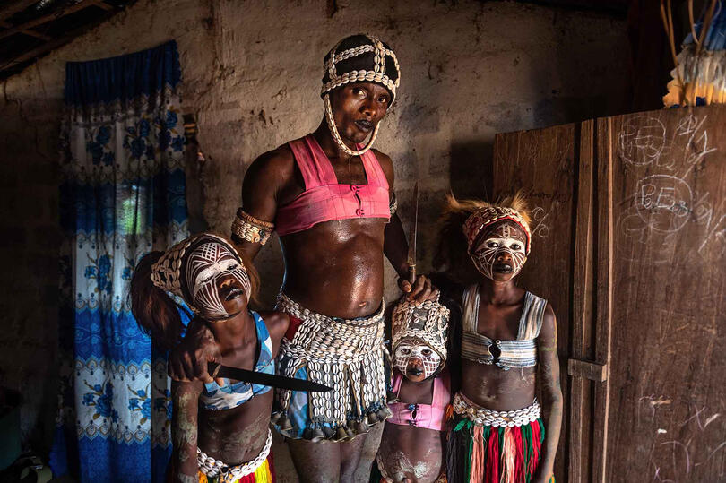 The Sambo's Girls Portrait of the spiritual leader, known as Sambo, with the snake girls Buy Print