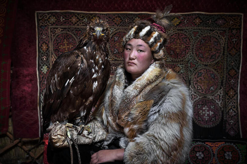 The Girl Who Speaks to Eagles Portrait of a young Kazakh eagle hunter Buy Print