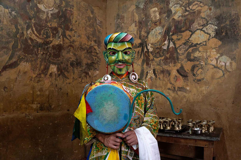 Atsara Portrait of a Atsara, the comical characters prancing around during the Tshechu © Roberto Pazzi