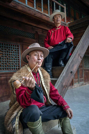 Tibetan Men Portrait of Tibetan men in their traditional attire © Roberto Pazzi
