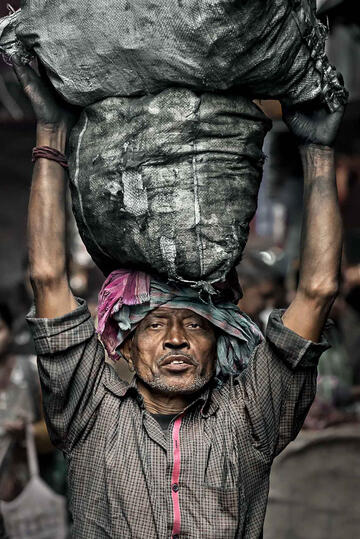 Burden of Life Portrait of a stevedor unloading coal Buy Print