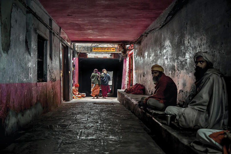 The Light at the End Street scene in Varanasi Buy Print