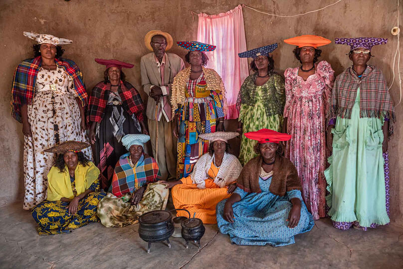Herero Group of Herero people gathered in the hall house © Roberto Pazzi