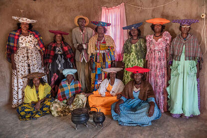 Herero Group of Herero people gathered in the hall house © Roberto Pazzi