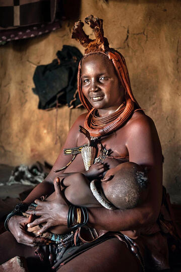 Motherly Love Portrait of a Himba woman with her baby © Roberto Pazzi