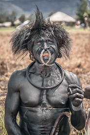 Tribal Smile Portrait of a smiling Dani leader © Roberto Pazzi