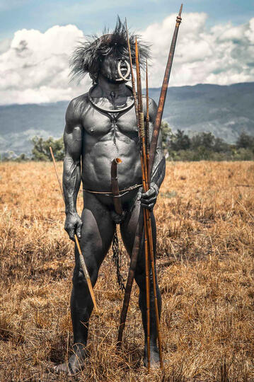 Into the Wild Portrait of a Dani leader in the traditional war attire Buy Print