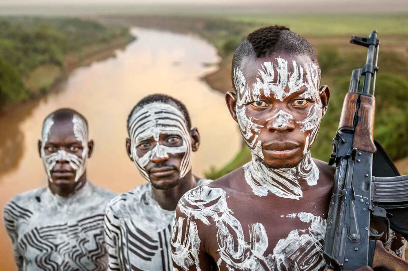 Patrolling Group of Kara tribesmen © Roberto Pazzi