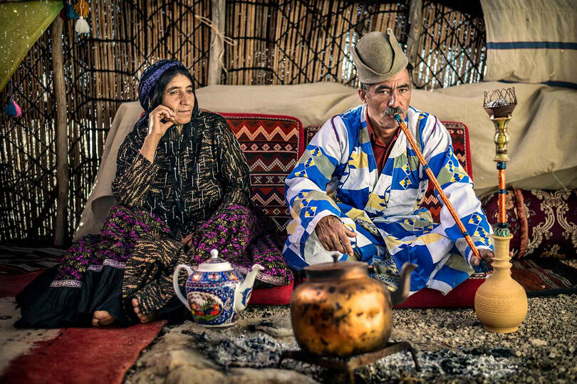 Qashqai People Portrait of a Qashqai tribesman with his wife © Roberto Pazzi