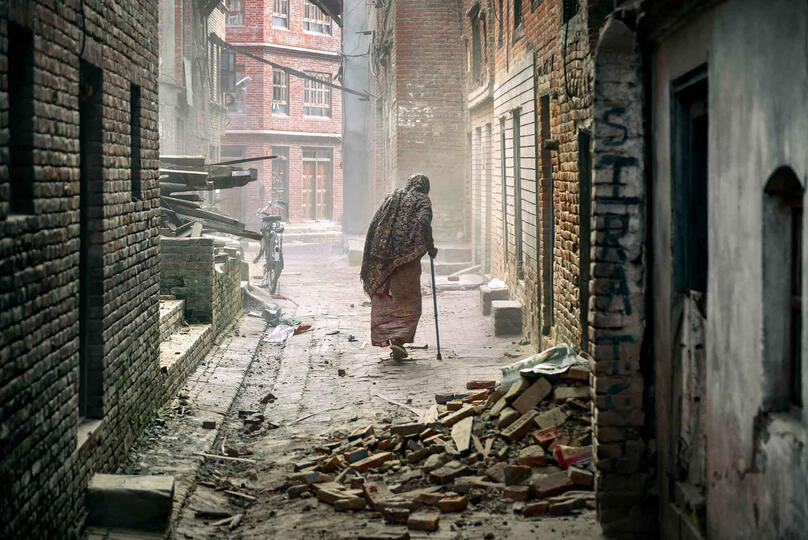 Fragile Street scene in Bhaktapur Buy Print