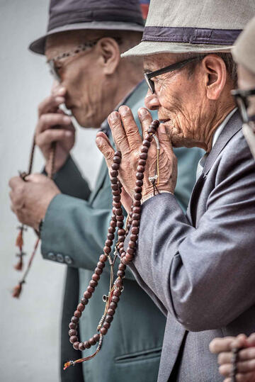Devotion Portrait of Buddhist devotees at prayer. Buy Print