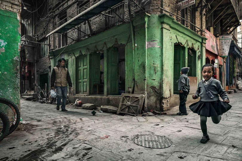 The Run Street scene in Kathmandu Buy Print
