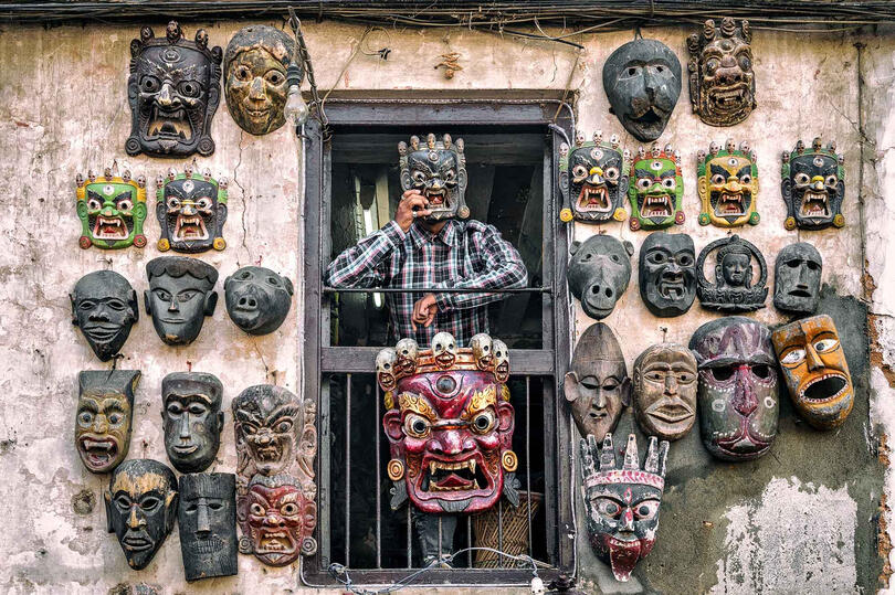 The Mask Seller Portrait of a mask seller in his family shop © Roberto Pazzi