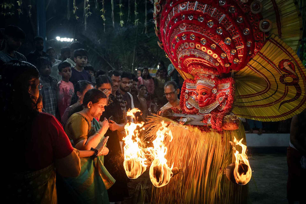 Shamanic Dance Through dance, the Theyyam ritual of Kerala (India) represents devotion and spiritual transformation. Shamans embody the connection between human and divine, becoming vessels for deities and ancestral spirits. © Roberto Pazzi